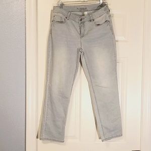 Chicos size 0 is a 4/6 faded denim jeans stretch with tummy control